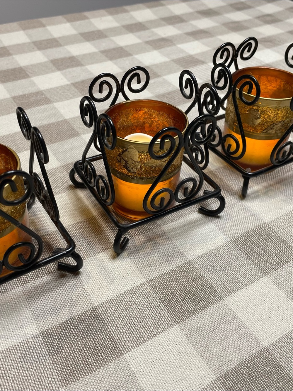 Set of 4 Amber Glass Tealight Holders with Black Scroll Metal Stand